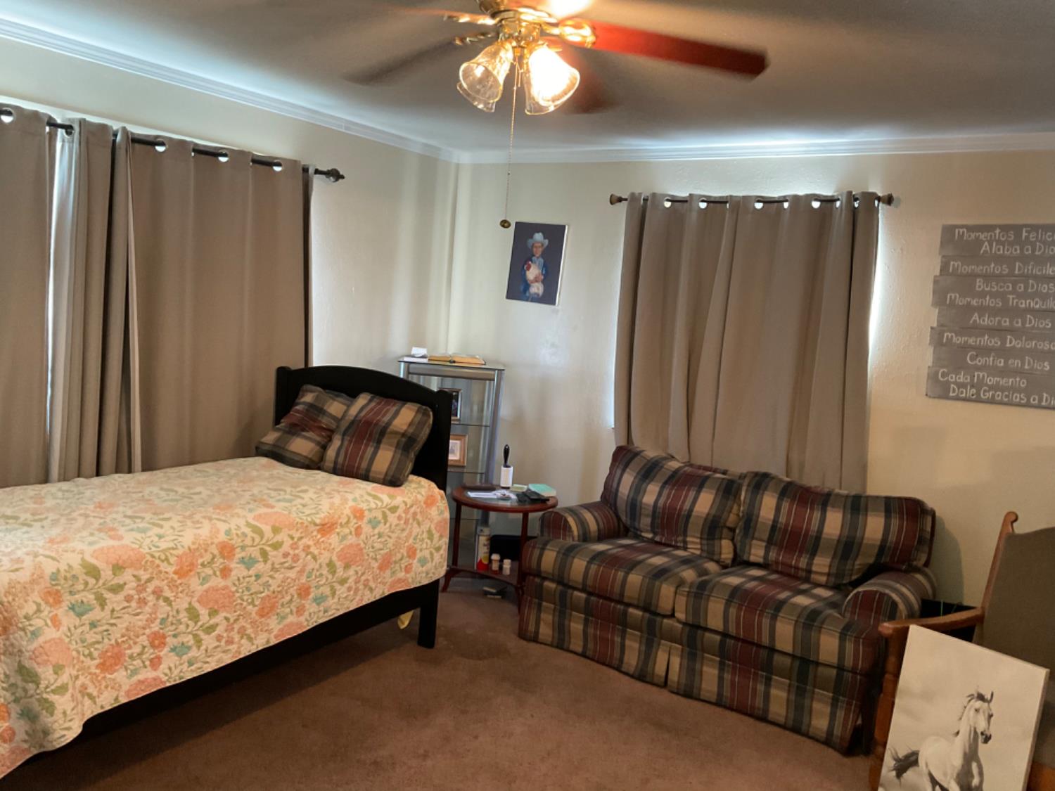915 R Street Merced, CA 95341 - Photo 29 of 44 a bedroom with a bed window and couch