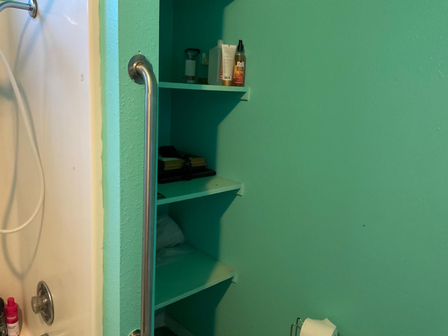 915 R Street Merced, CA 95341 - Photo 34 of 44 a bathroom with a sink and a mirror