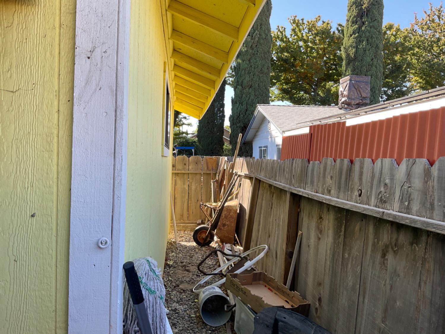 915 R Street Merced, CA 95341 - Photo 42 of 44 a view of balcony with wooden wall and outdoor seating