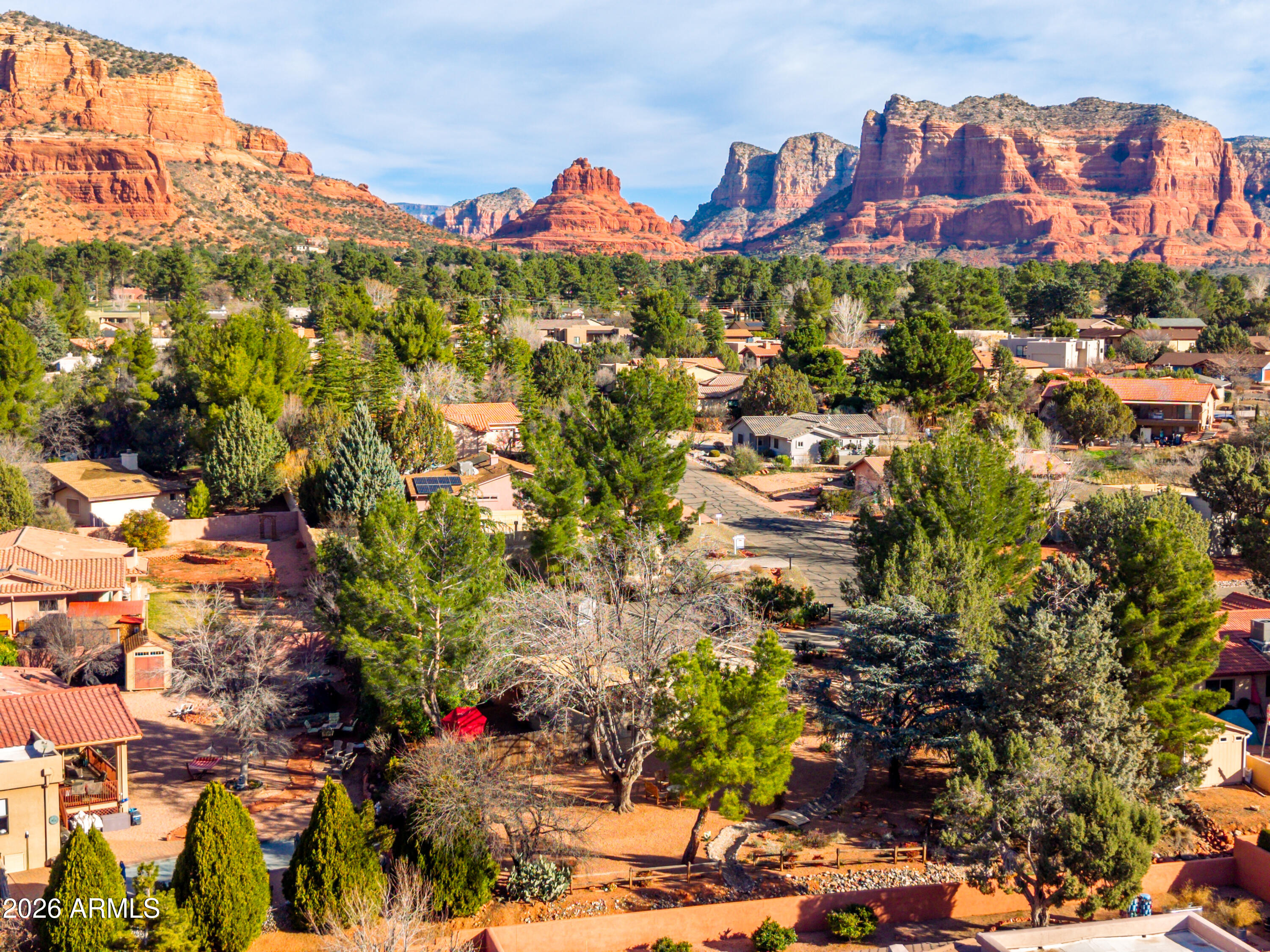 190 Creek Rock Road Sedona, AZ 86351 - Photo 35 of 41 a view of a city with a flower garden