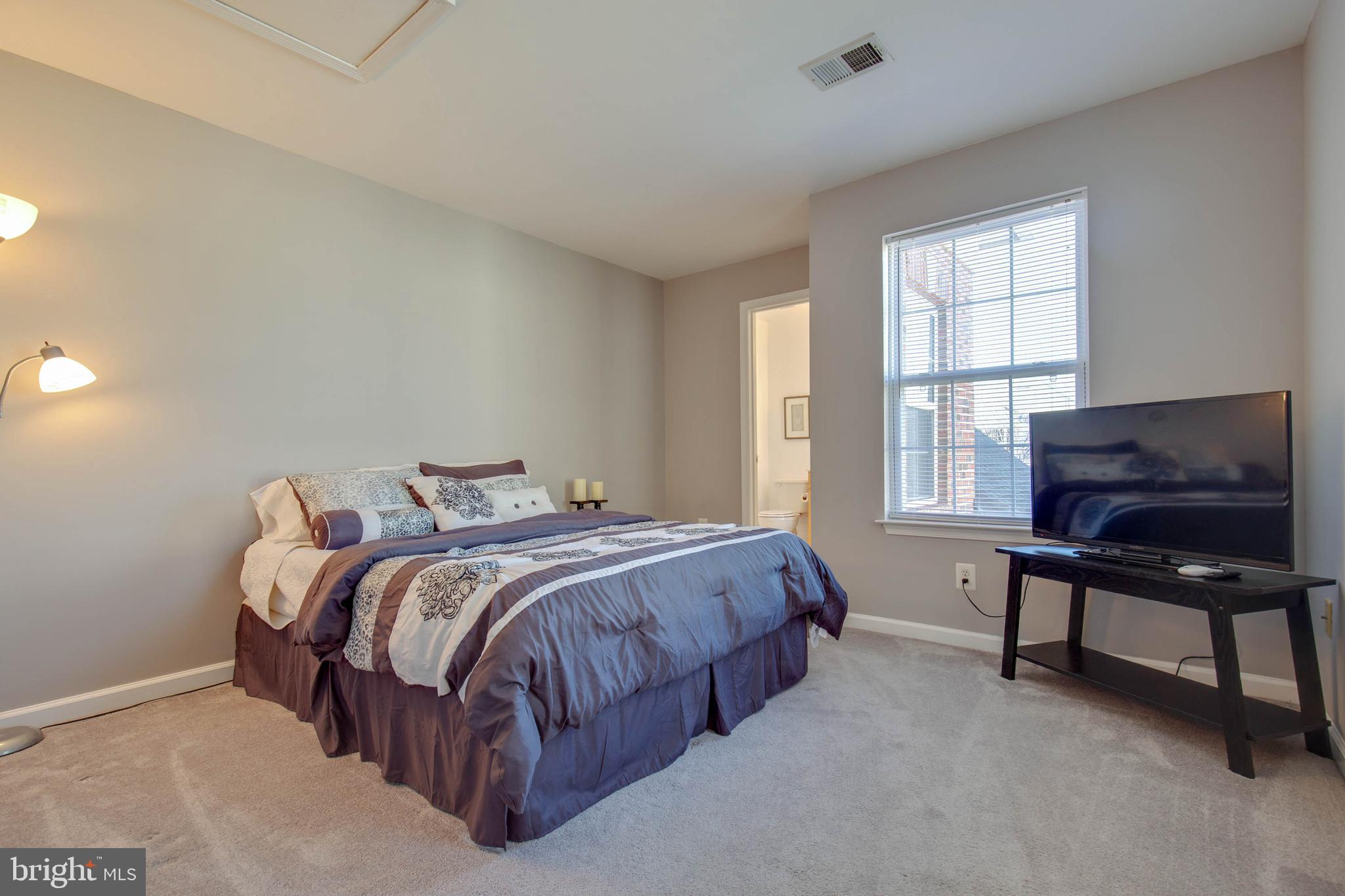 8371 Tillett Loop Manassas, VA 20110 - Photo 21 of 35 Upper Level Guest Suite