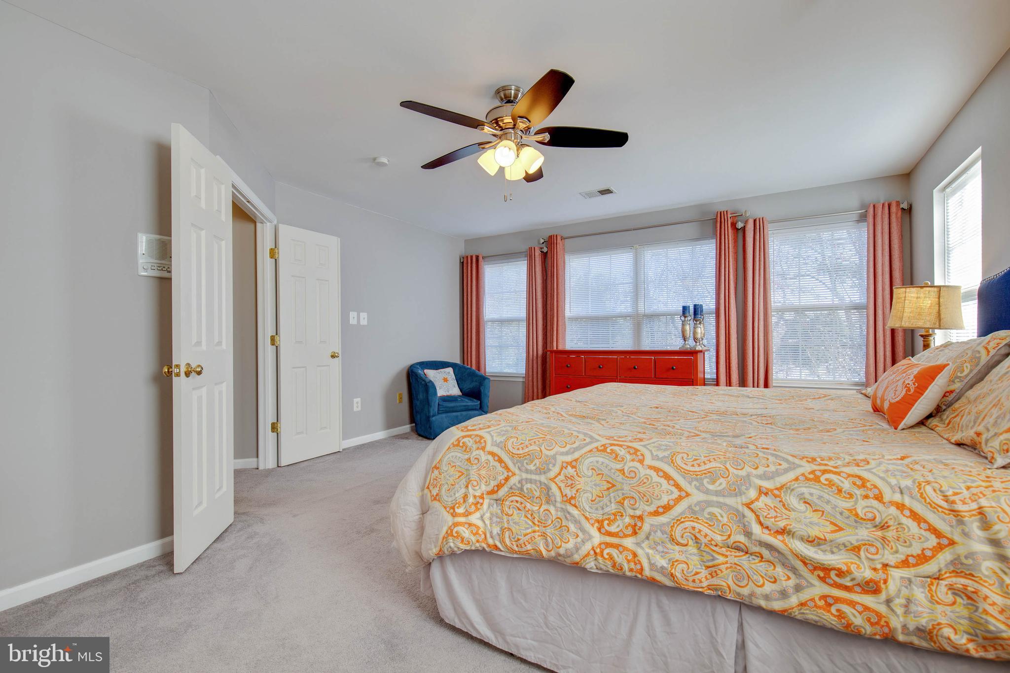 8371 Tillett Loop Manassas, VA 20110 - Photo 23 of 35 Spacious Master Suite with Wall of Windows