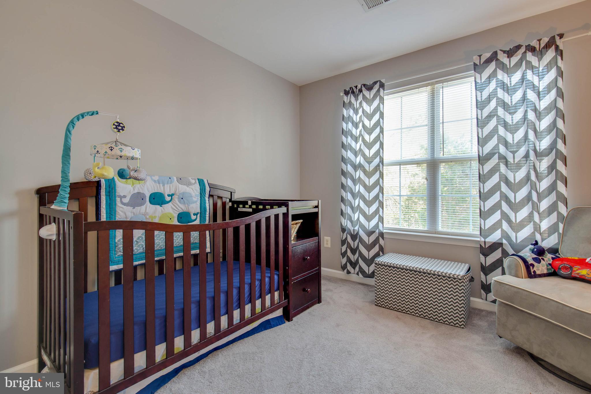8371 Tillett Loop Manassas, VA 20110 - Photo 25 of 35 Third Upper Level Bedroom