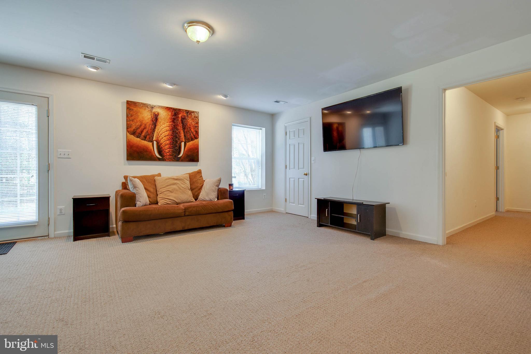 8371 Tillett Loop Manassas, VA 20110 - Photo 30 of 35 Basement Family Room with Lots of Light