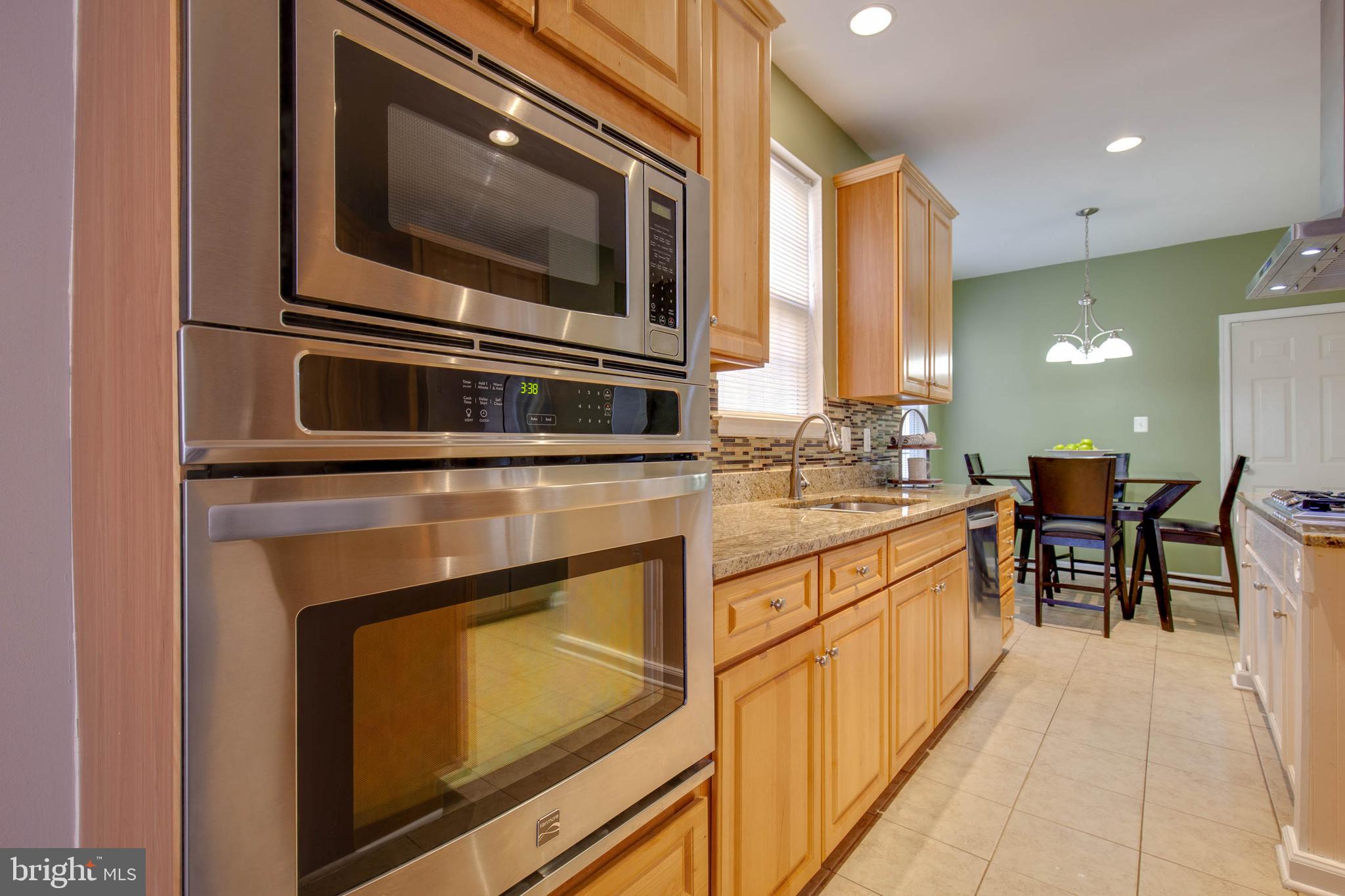 8371 Tillett Loop Manassas, VA 20110 - Photo 8 of 35 Upgraded Kitchen with Wall Oven/Micro Combo