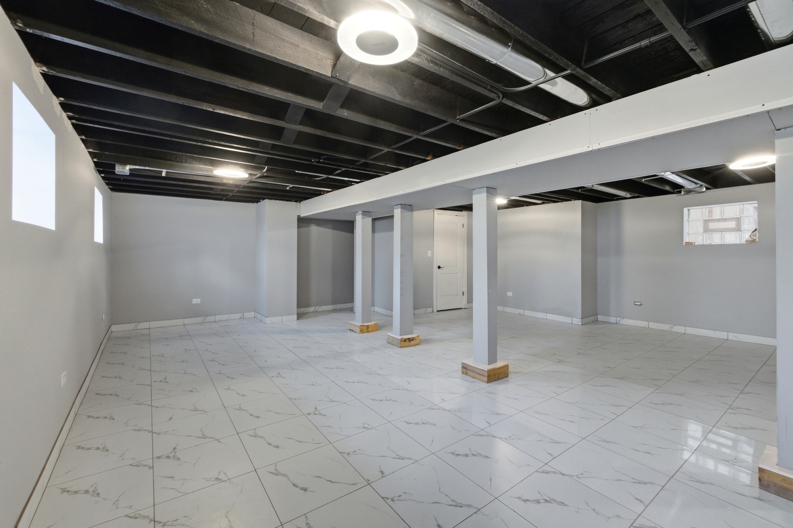 5915 West Iowa Street Chicago, IL 60651 - Photo 24 of 35 a view of empty room with wooden floor