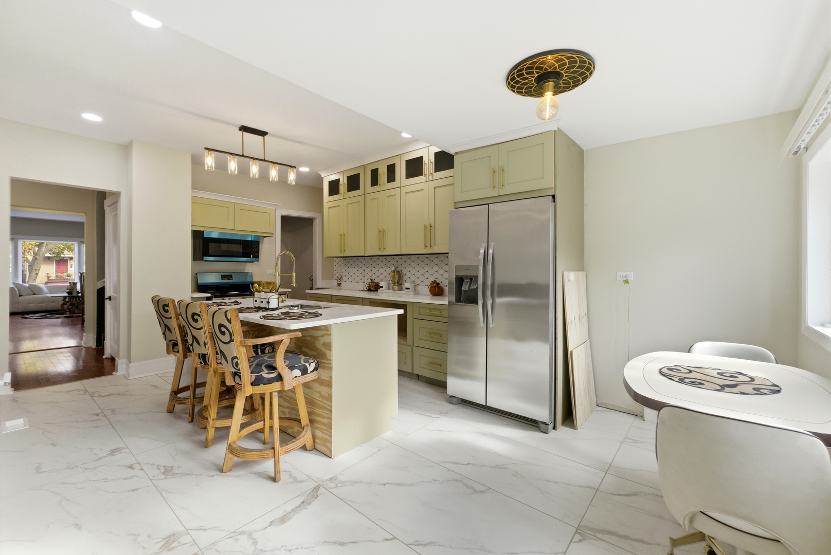 5915 West Iowa Street Chicago, IL 60651 - Photo 28 of 35 a kitchen with a table and chairs