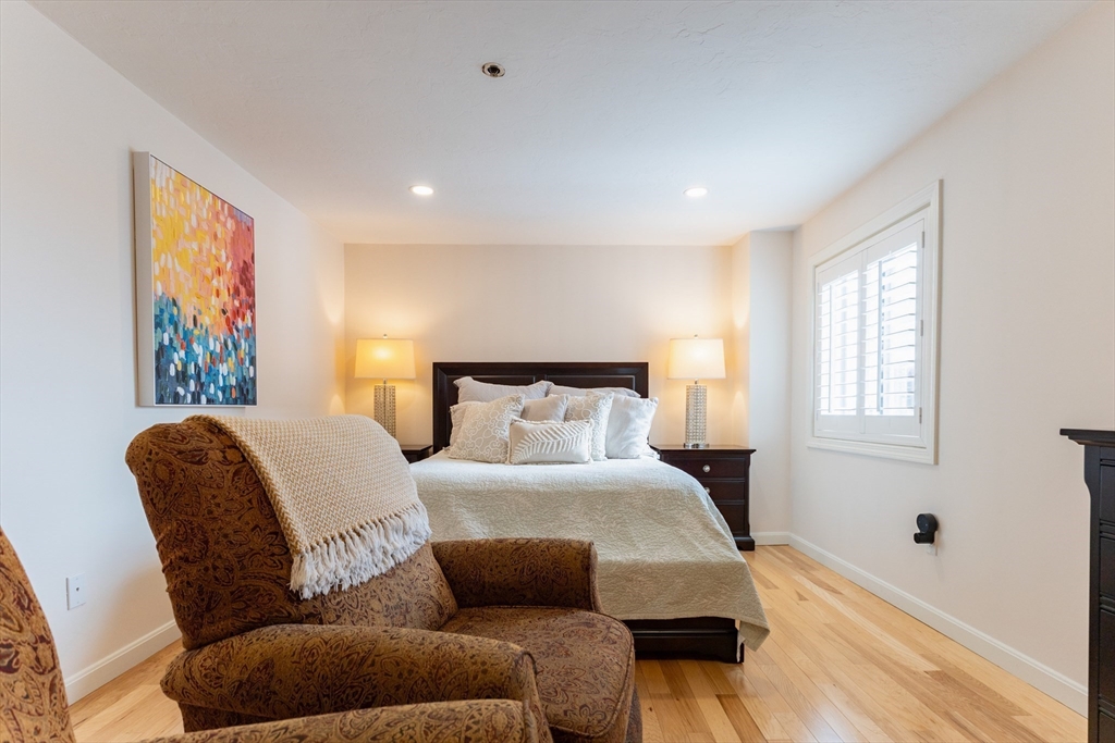 44 Elm Street, Unit 501 Worcester, MA 01609 - Photo 17 of 32 a bed room with bed and a large window