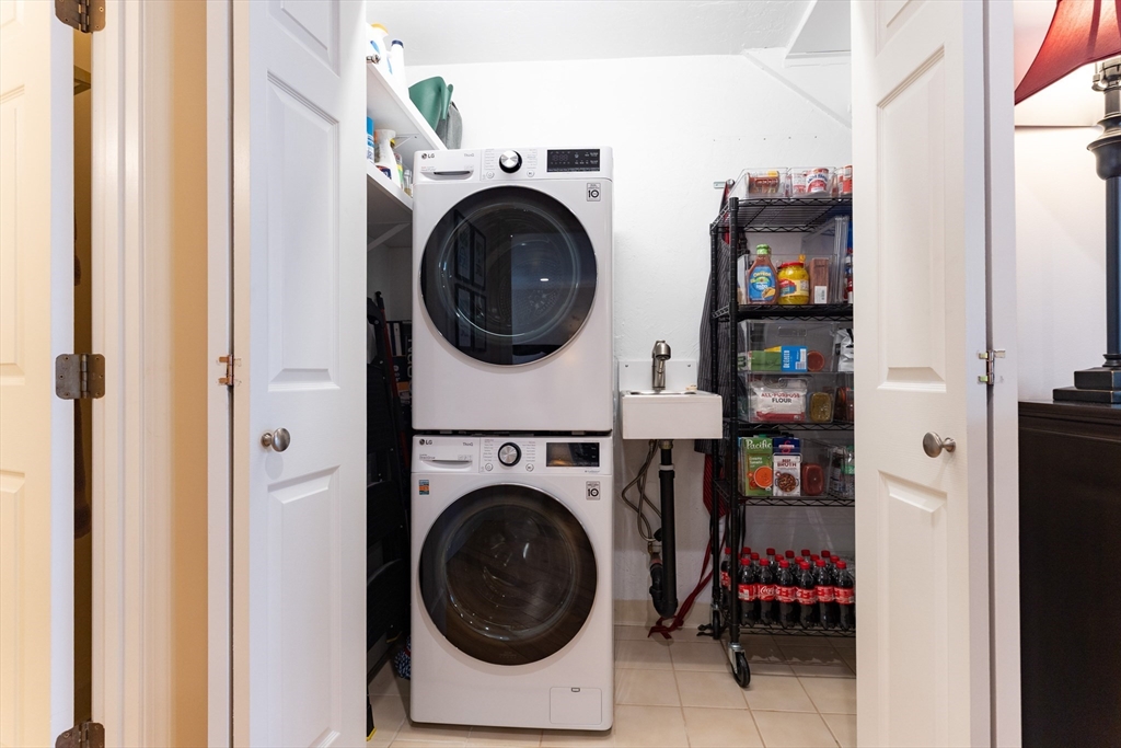 44 Elm Street, Unit 501 Worcester, MA 01609 - Photo 20 of 32 a utility room with dryer and washer