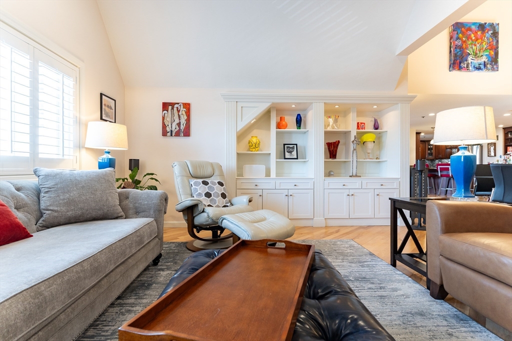 44 Elm Street, Unit 501 Worcester, MA 01609 - Photo 8 of 32 a living room with furniture kitchen and a window