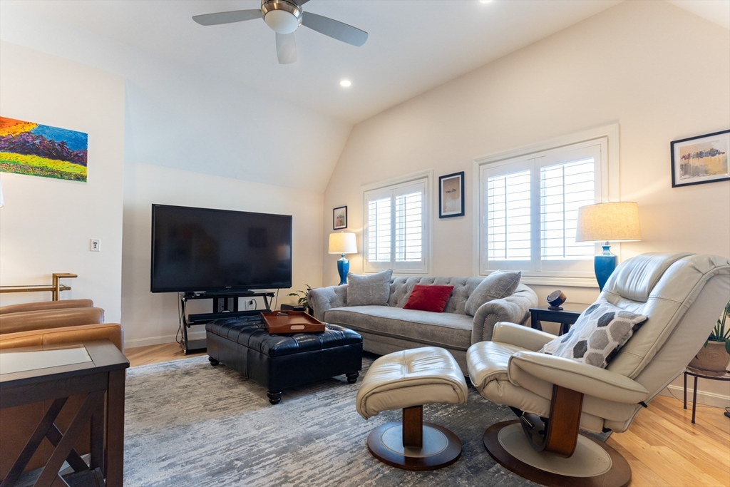 44 Elm Street, Unit 501 Worcester, MA 01609 - Photo 10 of 32 a living room with furniture and a flat screen tv