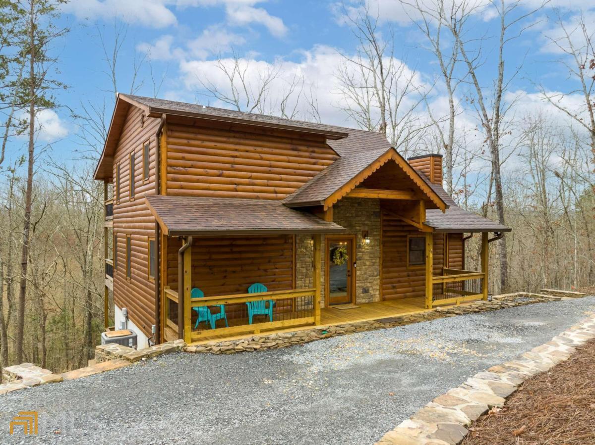 a front view of a house with a garage
