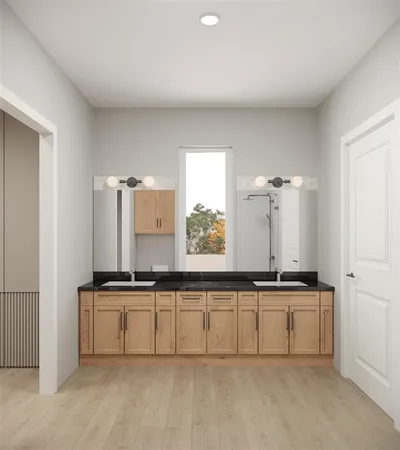 a kitchen with a sink and cabinets
