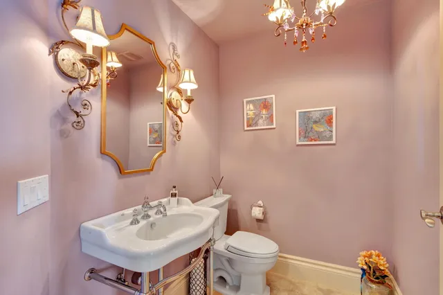 a room with a dresser and a mirror