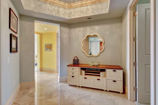 a bedroom with a bed dresser and a window