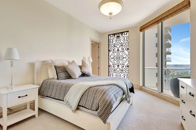 a view of a livingroom with furniture and workspace