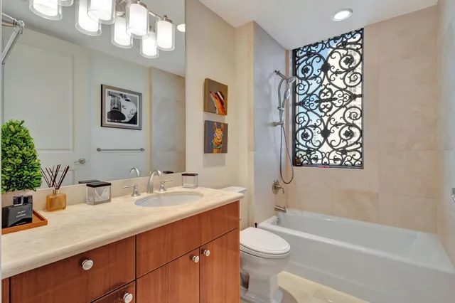 a room with furniture and a rug