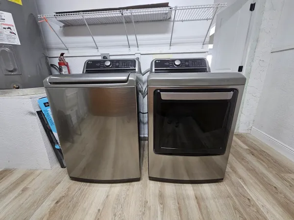a close view of a stove top oven and cabinets