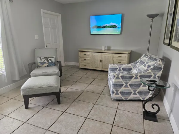 a bedroom with furniture and a bed