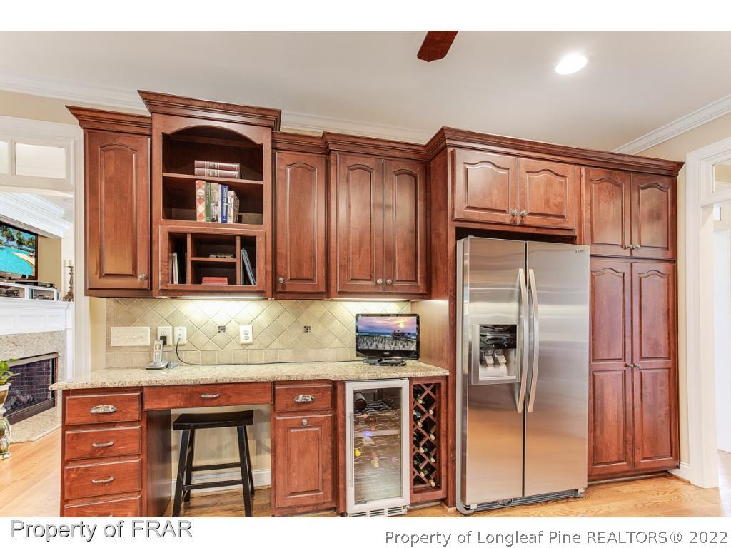 1517 Epic Way Hope Mills, NC 28348 - Photo 11 of 36 a kitchen with stainless steel appliances granite countertop a refrigerator and a microwave