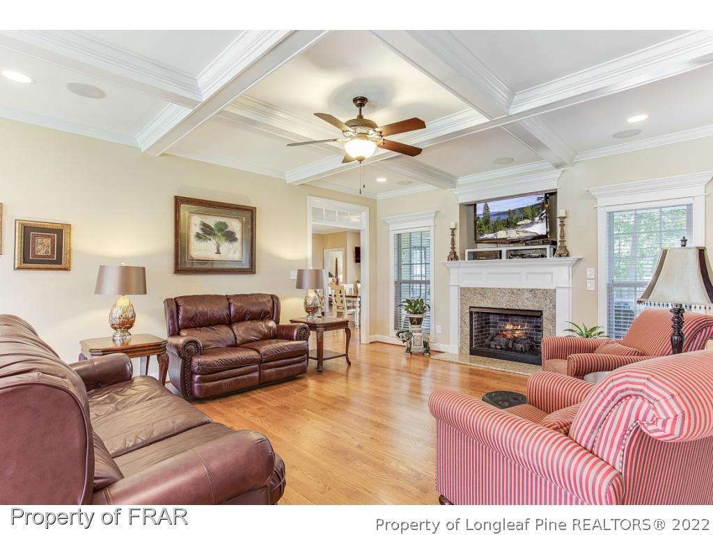 1517 Epic Way Hope Mills, NC 28348 - Photo 14 of 36 a living room with furniture and a fireplace