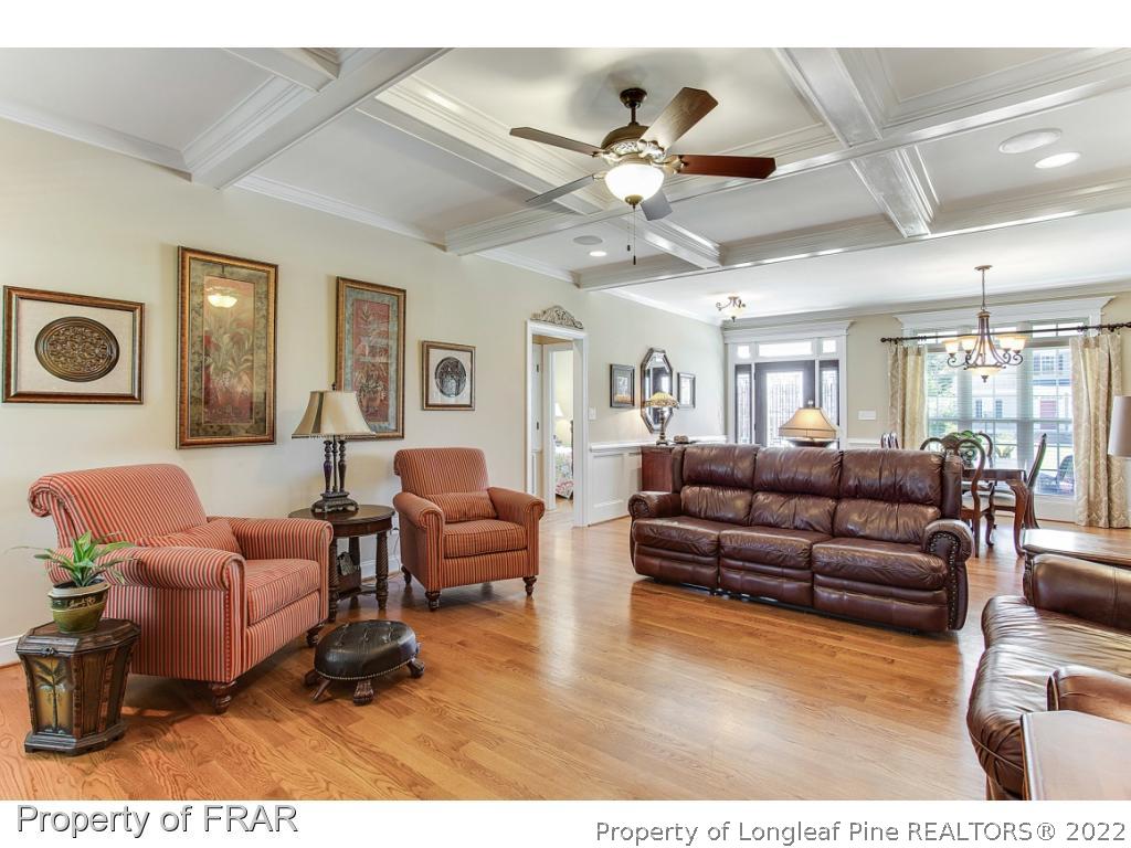 1517 Epic Way Hope Mills, NC 28348 - Photo 15 of 36 a living room with furniture ceiling fan and a rug