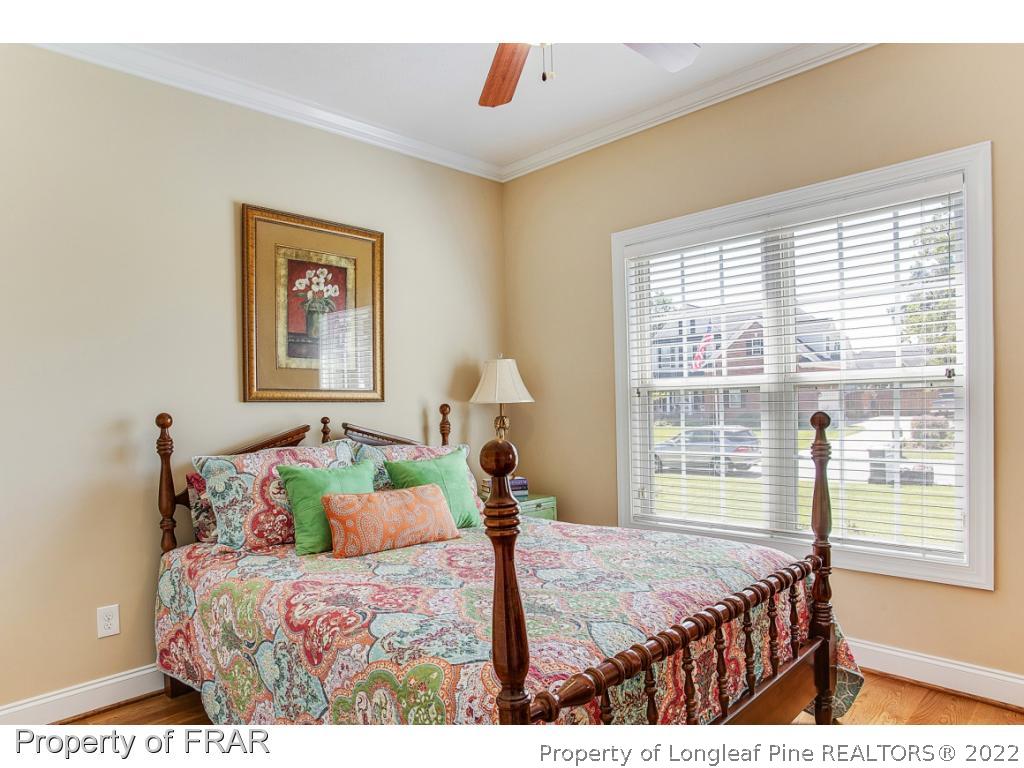 1517 Epic Way Hope Mills, NC 28348 - Photo 17 of 36 a bedroom with a bed and a large window