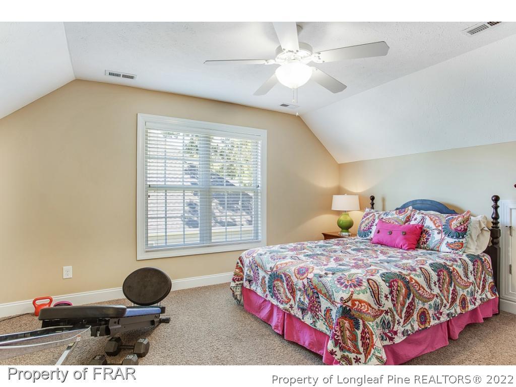 1517 Epic Way Hope Mills, NC 28348 - Photo 26 of 36 a bedroom with a bed and window