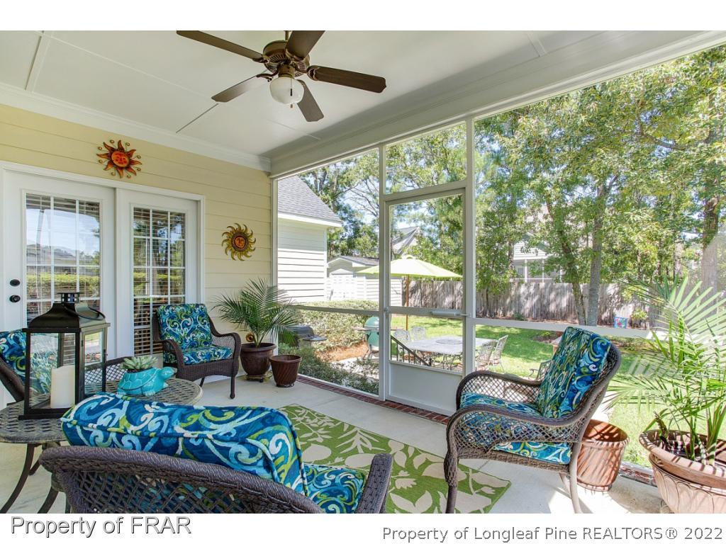 1517 Epic Way Hope Mills, NC 28348 - Photo 30 of 36 a living room with patio furniture and a large window