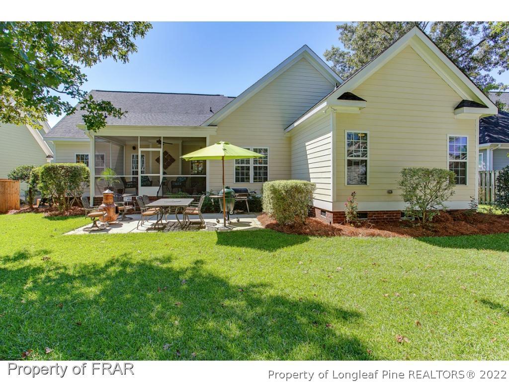 1517 Epic Way Hope Mills, NC 28348 - Photo 32 of 36 a front view of house with yard and outdoor seating
