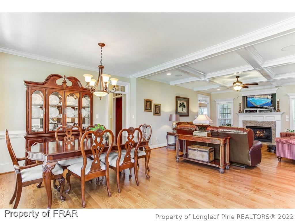 1517 Epic Way Hope Mills, NC 28348 - Photo 5 of 36 a view of a dining room with furniture window and wooden floor