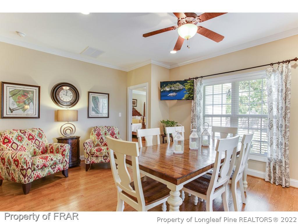 1517 Epic Way Hope Mills, NC 28348 - Photo 8 of 36 a dining room with furniture and window
