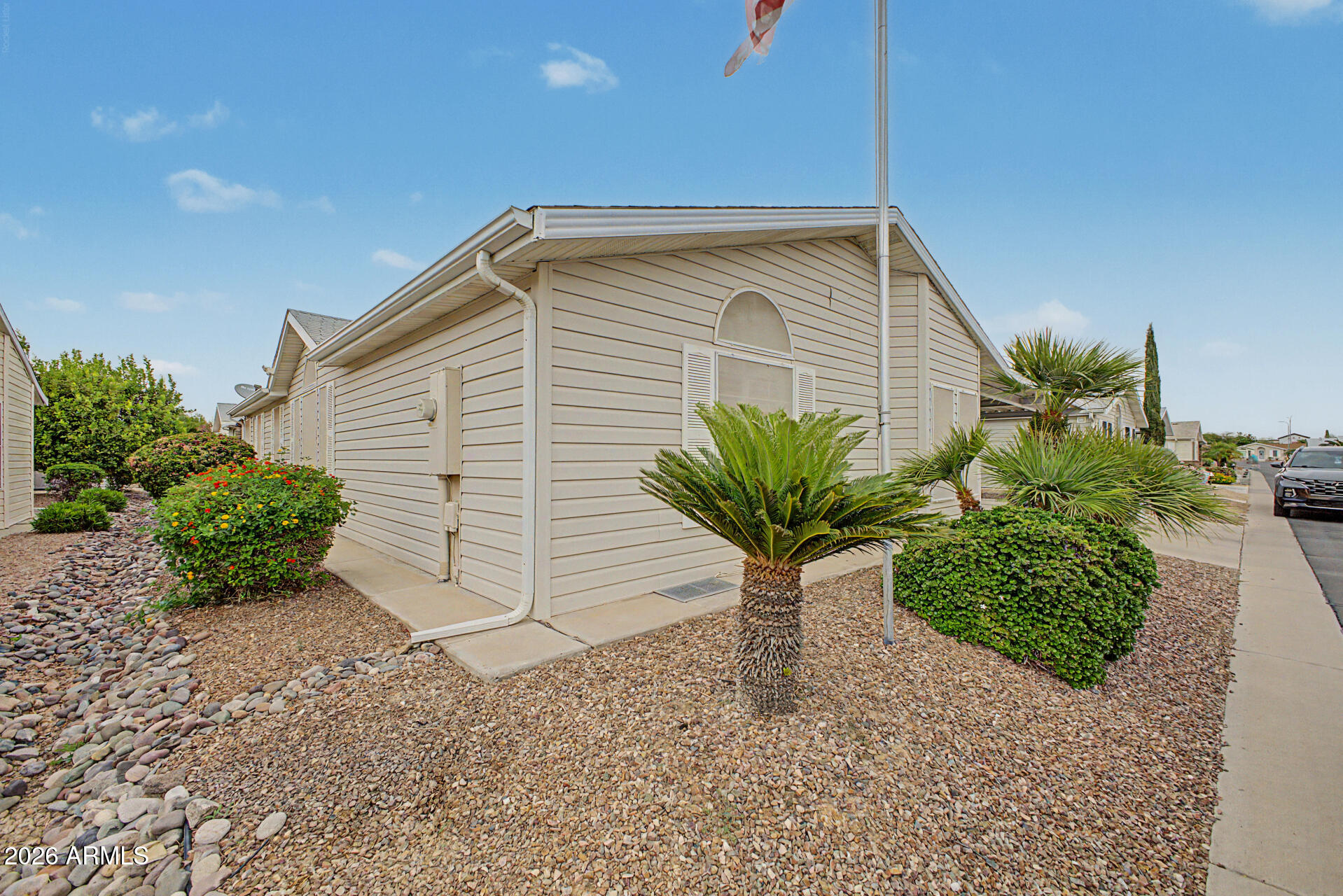 2550 South Ellsworth Road, Unit 611 Mesa, AZ 85209 - Photo 13 of 34 a view of a house with a street