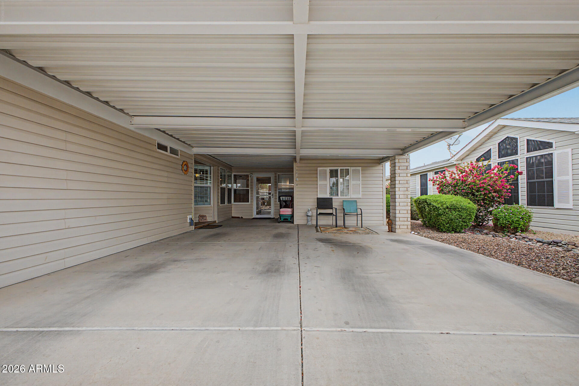2550 South Ellsworth Road, Unit 611 Mesa, AZ 85209 - Photo 15 of 34 a view of a house with a garage