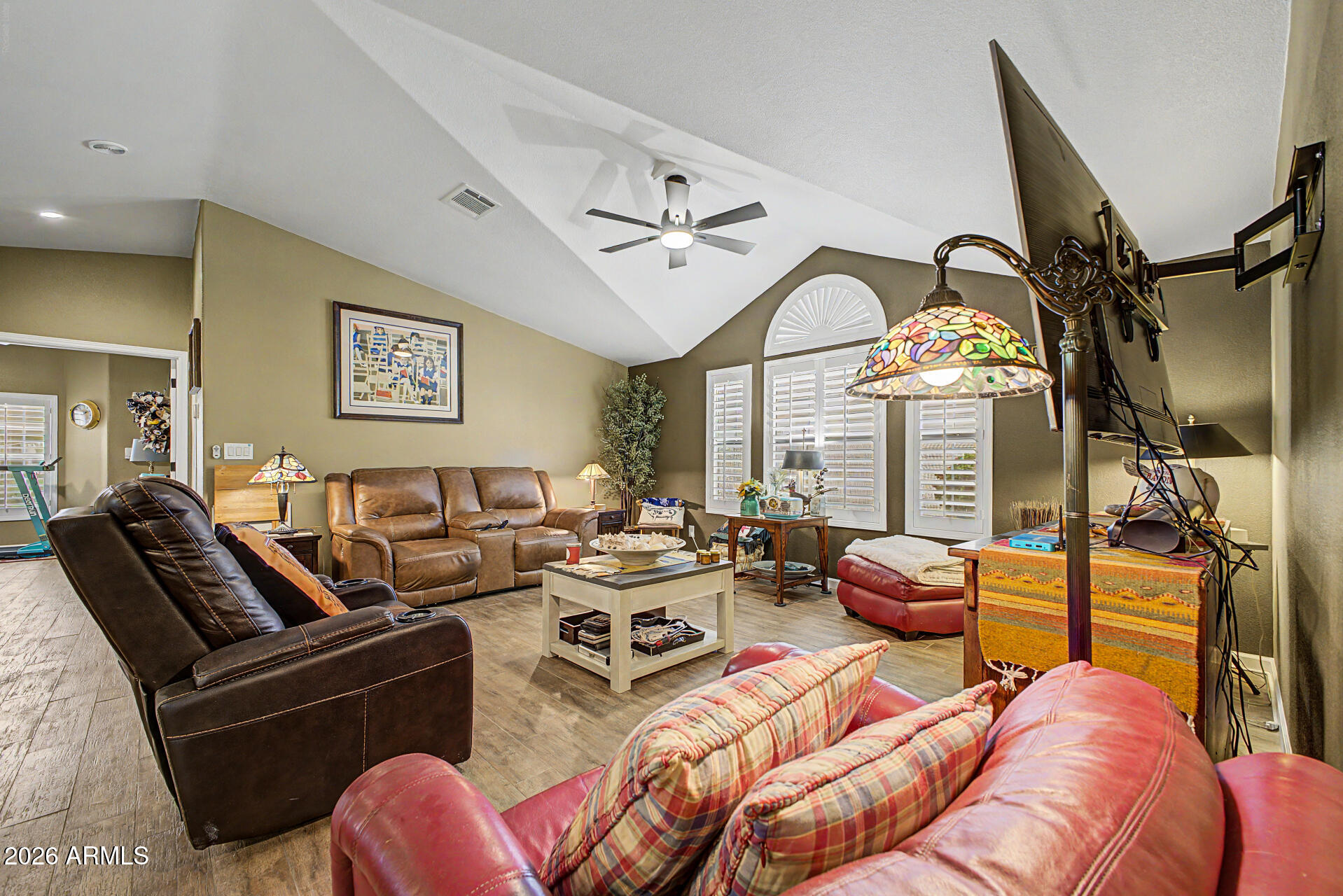 2550 South Ellsworth Road, Unit 611 Mesa, AZ 85209 - Photo 16 of 34 a living room with furniture a rug and a window
