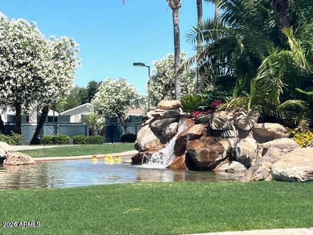 2550 South Ellsworth Road, Unit 611 Mesa, AZ 85209 - Photo 26 of 34 a view of a park with large trees