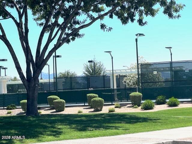 2550 South Ellsworth Road, Unit 611 Mesa, AZ 85209 - Photo 27 of 34 a view of a bench in the patio