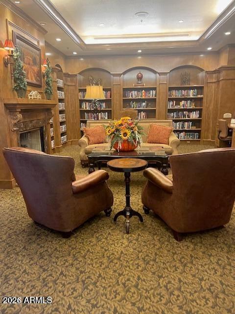 2550 South Ellsworth Road, Unit 611 Mesa, AZ 85209 - Photo 29 of 34 a living room with couches and a coffee table with kitchen view