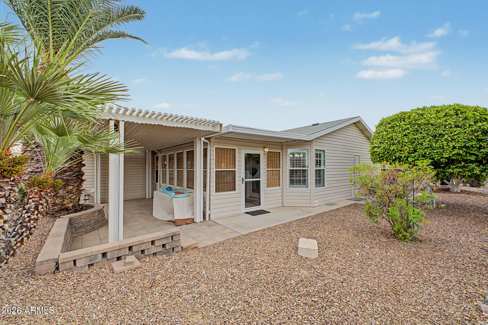 2550 South Ellsworth Road, Unit 611 Mesa, AZ 85209 - Photo 3 of 34 front view of a house with a patio