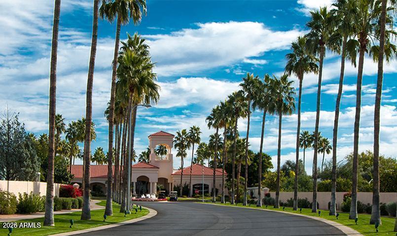 2550 South Ellsworth Road, Unit 611 Mesa, AZ 85209 - Photo 32 of 34 a city street with palm trees