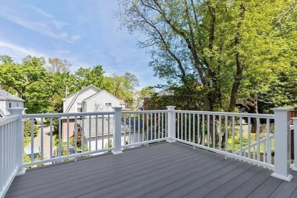 a view of a chairs on the roof deck