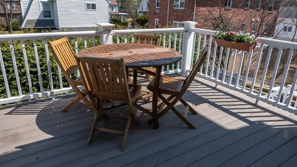 a view of a chairs on the deck