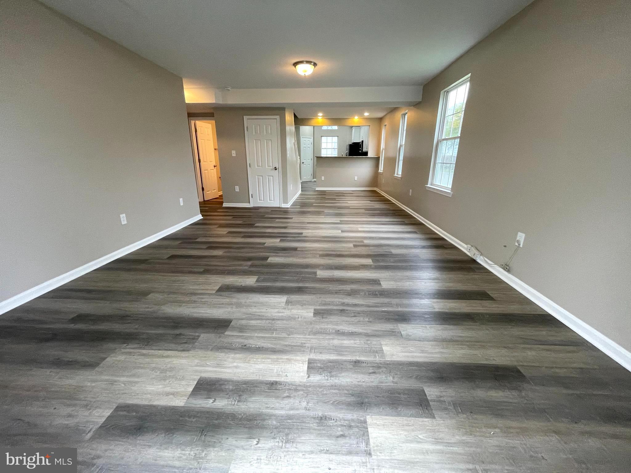 236 Meadow Road Pasadena, MD 21122 - Photo 2 of 28 Spacious living - dining room area