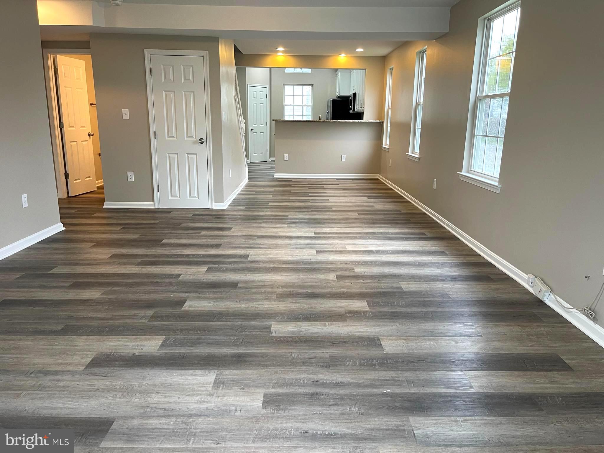 236 Meadow Road Pasadena, MD 21122 - Photo 3 of 28 New LVP flooring and fresh paint
