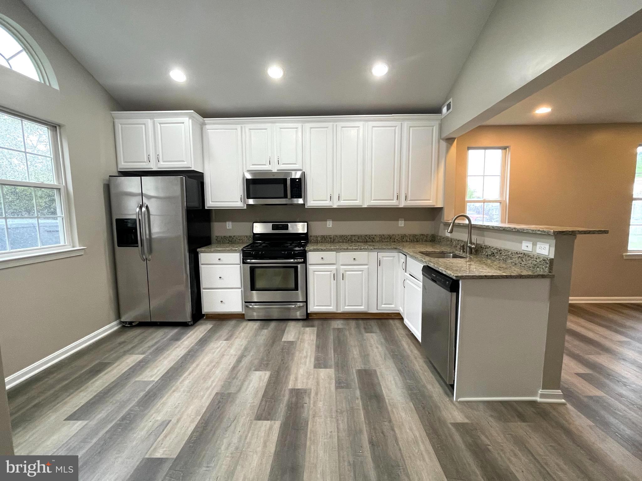 236 Meadow Road Pasadena, MD 21122 - Photo 6 of 28 Updated kitchen with SS appliances & granite