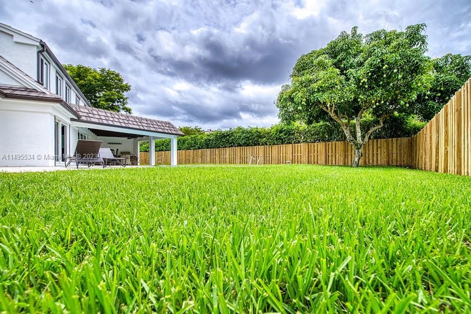 3010 Equestrian Drive Boca Raton, FL 33434 - Photo 12 of 53 a view of house with backyard