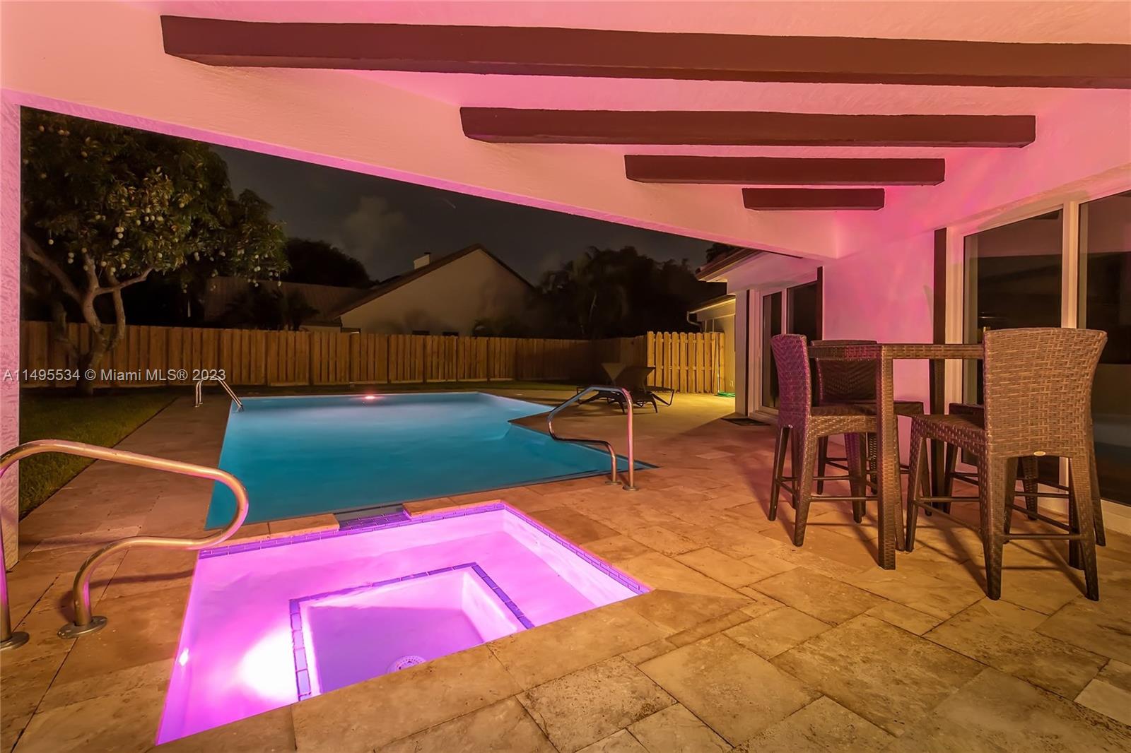3010 Equestrian Drive Boca Raton, FL 33434 - Photo 14 of 53 a view of a chairs and tables in patio