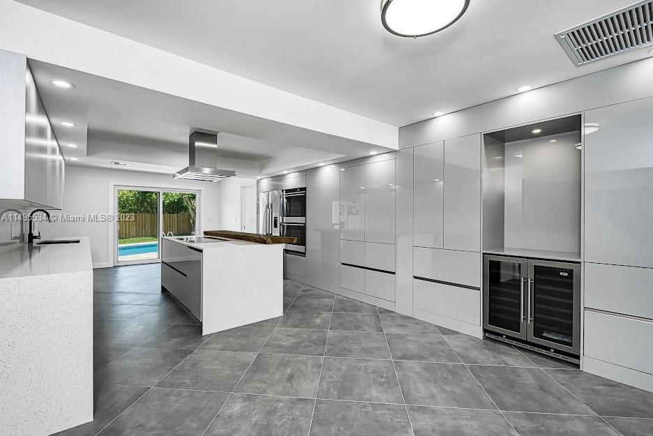 3010 Equestrian Drive Boca Raton, FL 33434 - Photo 22 of 53 a room with gym equipment and a large window