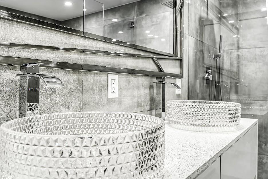 3010 Equestrian Drive Boca Raton, FL 33434 - Photo 33 of 53 a bathroom with a bathtub