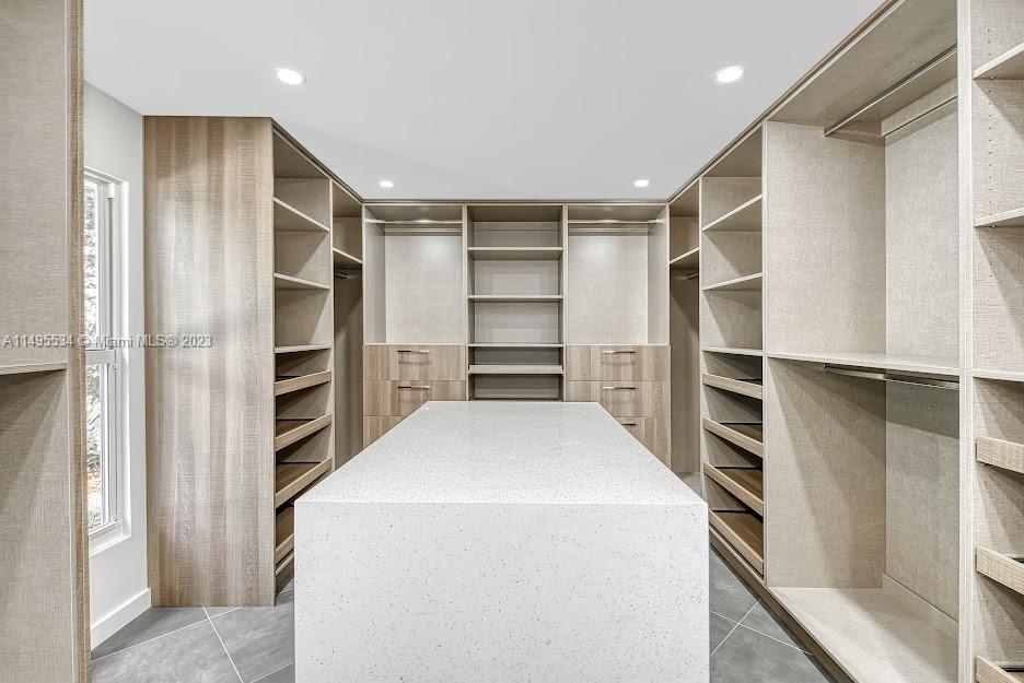 3010 Equestrian Drive Boca Raton, FL 33434 - Photo 36 of 53 a view of walk in closet with empty racks